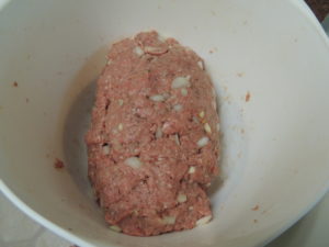 Roll it up into a loaf shape in the bowl to make moving it to the slow cooker a bit easier