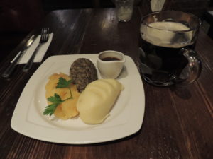 Haggis, neeps and tatties with a pint