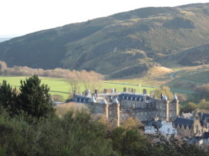 Holyrood Palace in the distance and Arthur's Seat